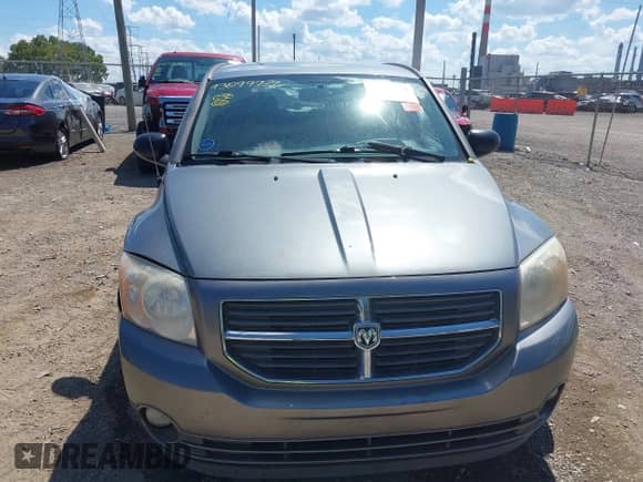 2011 Dodge Caliber Mainstreet z VIN 1B3CB3HA5BD297625, wystawiony jako IAAI lot #43099772 z przebiegiem 236 553 mil mil oraz . Historia ofert i sprzedaży dostępna na DreamBid. Obrazek 12.