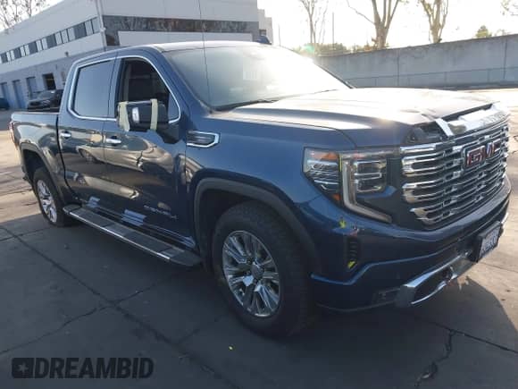 2023 GMC Sierra 1500 Denali z VIN 1GTUUGELXPZ168669, wystawiony jako IAAI lot #43378099 z przebiegiem 67 294 mil mil oraz . Historia ofert i sprzedaży dostępna na DreamBid. Obrazek 1.