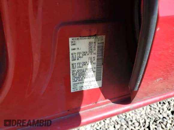2009 Nissan Frontier SE with VIN 1N6AD07W59C425693, listed as a Copart auction lot 69923245 with 124,476 mi miles and Salvage title. Bid and sale history available at DreamBid. Image 12.