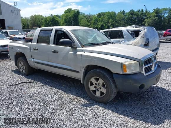2006 Dodge Dakota SLT с VIN 1D7HW48N96S641448, выставлен на аукционе IAAI как лот 42766454 с пробегом 176 000 миль миль и . История ставок и продаж доступна на DreamBid. Изображение 1.