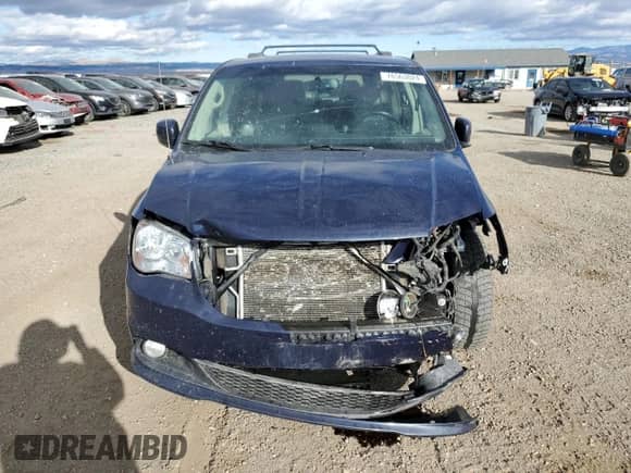2014 Dodge Grand Caravan Crew z VIN 2C4RDGDG7ER371715, wystawiony jako Copart lot #76563024 z przebiegiem 151 453 mil mil oraz Szkoda całkowita • Salvage title. Historia ofert i sprzedaży dostępna na DreamBid. Obrazek 5.