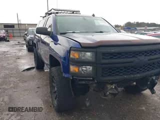 2014 Chevrolet Silverado 1500 Work Truck z VIN 1GCNKPECXEZ291525, wystawiony jako IAAI lot #41548468 z przebiegiem 59 546 mil mil oraz . Historia ofert i sprzedaży dostępna na DreamBid. Obrazek 1.
