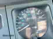 1992 Jeep Wrangler с VIN 2J4FY19P2NJ525592, выставлен на аукционе Copart как лот 63951475 с пробегом 156 627 миль миль и Чистый • Clean title. История ставок и продаж доступна на DreamBid. Изображение 8.