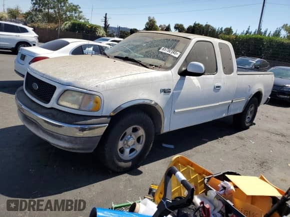 2001 Ford F-150 XL z VIN 1FTZX17271KF28673, wystawiony jako Copart lot #65750145 z przebiegiem Nie podano mil oraz Czysty tytuł • Clean title. Historia ofert i sprzedaży dostępna na DreamBid. Obrazek 1.