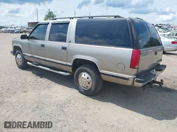 1999 Chevrolet Suburban with VIN 3GNGC26J8XG144488, listed as a IAAI auction lot 42486287 with 219,196 mi miles and . Bid and sale history available at DreamBid. Image 3.