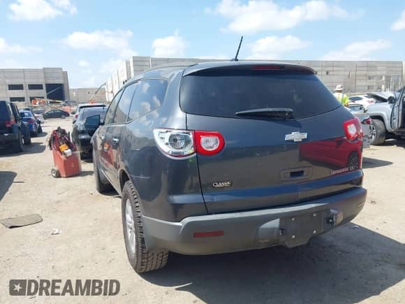 2011 Chevrolet Traverse LS z VIN 1GNKRFED4BJ201286, wystawiony jako IAAI lot #42698194 z przebiegiem 244 763 mil mil oraz . Historia ofert i sprzedaży dostępna na DreamBid. Obrazek 3.