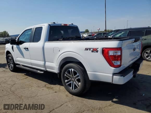 2023 Ford F-150 XL with VIN 1FTEX1EP6PKD76875, listed as a Copart auction lot 80718095 with 14,792 mi miles and Salvage title. Bid and sale history available at DreamBid. Image 2.