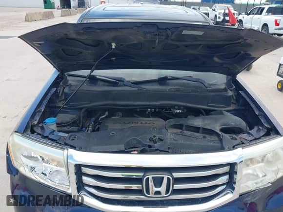 2013 Honda Pilot EX-L with VIN 5FNYF4H65DB025730, listed as a IAAI auction lot 42958483 with 223,631 mi miles and . Bid and sale history available at DreamBid. Image 10.