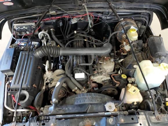 1999 Jeep Wrangler Sport z VIN 1J4FY19S0XP487645, wystawiony jako Copart lot #84068725 z przebiegiem 197 001 mil mil oraz Czysty tytuł • Clean title. Historia ofert i sprzedaży dostępna na DreamBid. Obrazek 11.