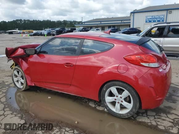 2013 Hyundai Veloster w/Gray Int z VIN KMHTC6AD8DU087858, wystawiony jako Copart lot #61438185 z przebiegiem Nie podano mil oraz Szkoda całkowita • Salvage title. Historia ofert i sprzedaży dostępna na DreamBid. Obrazek 2.
