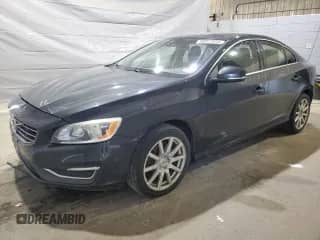 2014 Volvo S60 T5 с VIN YV1612FH6E2276916, выставлен на аукционе Copart как лот 69001855 с пробегом 121 441 миль миль и Списание • Salvage title. История ставок и продаж доступна на DreamBid. Изображение 1.