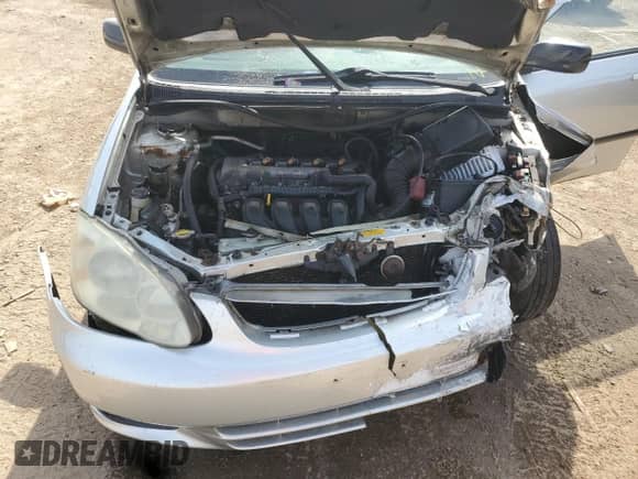 2003 Toyota Corolla CE с VIN JTDBR32E732012227, выставлен на аукционе Copart как лот 80644055 с пробегом Не указан миль и Списание • Salvage title. История ставок и продаж доступна на DreamBid. Изображение 11.
