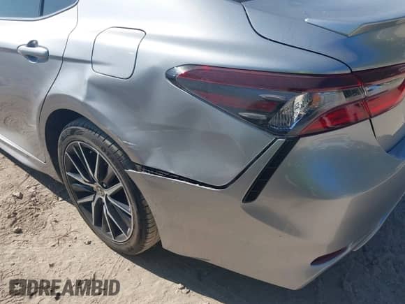 2023 Toyota Camry SE z VIN 4T1G11AK3PU791463, wystawiony jako IAAI lot #43412087 z przebiegiem 66 858 mil mil oraz . Historia ofert i sprzedaży dostępna na DreamBid. Obrazek 12.