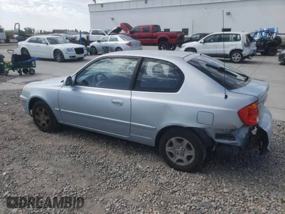 2005 Hyundai Accent GLS z VIN KMHCG35C55U341192, wystawiony jako Copart lot #70708994 z przebiegiem 174 872 mil mil oraz Szkoda całkowita • Salvage title. Historia ofert i sprzedaży dostępna na DreamBid. Obrazek 2.