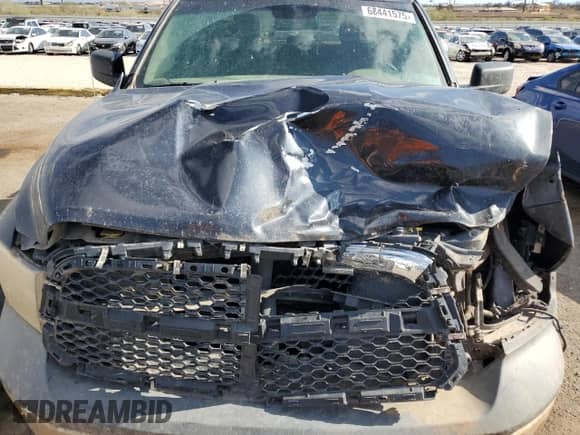 2018 Ram 1500 Tradesman z VIN 1C6RR6FG5JS266003, wystawiony jako Copart lot #68441575 z przebiegiem 125 554 mil mil oraz Szkoda całkowita • Salvage title. Historia ofert i sprzedaży dostępna na DreamBid. Obrazek 11.