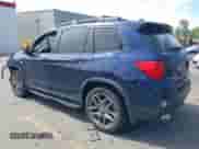 2023 Honda Passport EX-L with VIN 5FNYF8H50PB007445, listed as a IAAI auction lot 42462561 with 33,540 mi miles and . Bid and sale history available at DreamBid. Image 3.