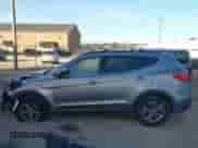 2014 Hyundai Santa Fe with VIN 5XYZU3LB2EG200499, listed as a IAAI auction lot 43392142 with 228,552 mi miles and . Bid and sale history available at DreamBid. Image 15.