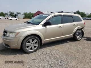 2009 Dodge Journey SE с VIN 3D4GG47B39T556928, выставлен на аукционе Copart как лот 64959625 с пробегом 200 457 миль миль и Чистый • Clean title. История ставок и продаж доступна на DreamBid. Изображение 1.