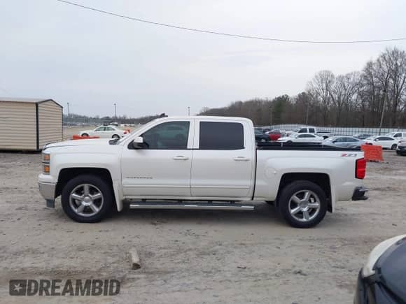 2015 Chevrolet Silverado 1500 LT with VIN 3GCUKREC4FG227814, listed as a IAAI auction lot 41501424 with 196,342 mi miles and . Bid and sale history available at DreamBid. Image 14.