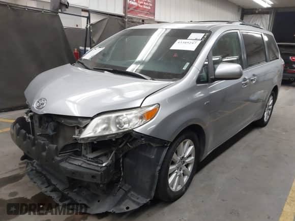 2017 Toyota Sienna XLE with VIN 5TDDZ3DC0HS160692, listed as a IAAI auction lot 43389247 with 164,933 mi miles and . Bid and sale history available at DreamBid. Image 2.