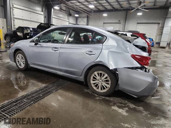 2017 Subaru Impreza Premium с VIN 4S3GKAB61H3609561, выставлен на аукционе Copart как лот 80363265 с пробегом 60 645 миль миль и Списание • Salvage title. История ставок и продаж доступна на DreamBid. Изображение 2.