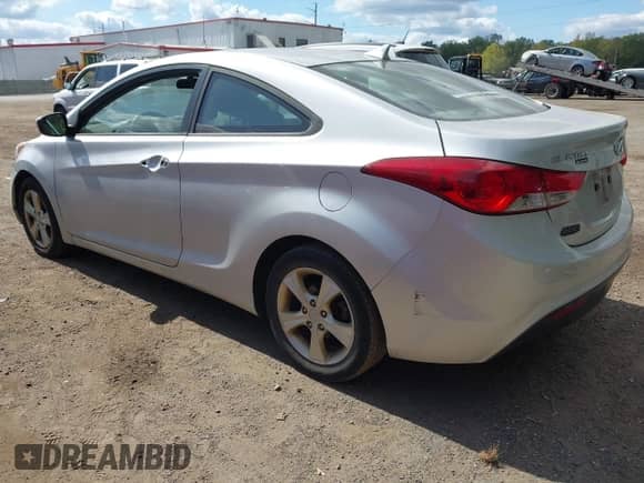 2013 Hyundai Elantra GS z VIN KMHDH6AE1DU007007, wystawiony jako IAAI lot #43315432 z przebiegiem 167 171 mil mil oraz . Historia ofert i sprzedaży dostępna na DreamBid. Obrazek 3.