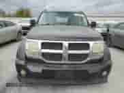 2009 Dodge Nitro SXT с VIN 1D8GU28K59W527001, выставлен на аукционе Copart как лот 77988964 с пробегом 157 787 миль миль и Списание • Salvage title. История ставок и продаж доступна на DreamBid. Изображение 5.