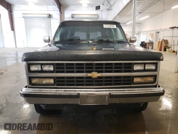 1989 Chevrolet Suburban с VIN 1GNEV16K3KF102065, выставлен на аукционе Copart как лот 67449295 с пробегом 63 027 миль миль и Чистый • Clean title. История ставок и продаж доступна на DreamBid. Изображение 5.