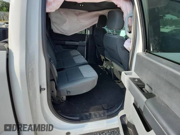 2023 Ford F-150 Lariat with VIN 1FTFW1E89PFA91516, listed as a Copart auction lot 61666315 with 65,711 mi miles and Salvage title. Bid and sale history available at DreamBid. Image 10.