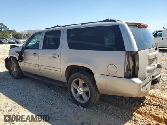 2009 Chevrolet Suburban 1LT z VIN 1GNFC26029J105867, wystawiony jako Copart lot #49465495 z przebiegiem 206 684 mil mil oraz Szkoda całkowita • Salvage title. Historia ofert i sprzedaży dostępna na DreamBid. Obrazek 2.