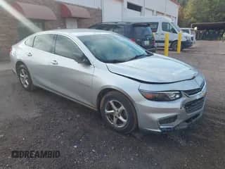 2018 Chevrolet Malibu LS z VIN 1G1ZB5ST6JF261016, wystawiony jako IAAI lot #43184858 z przebiegiem 157 040 mil mil oraz . Historia ofert i sprzedaży dostępna na DreamBid. Obrazek 1.
