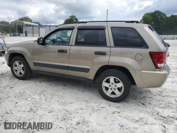 2005 Jeep Grand Cherokee Laredo z VIN 1J4HR48NX5C727601, wystawiony jako Copart lot #70047965 z przebiegiem 160 970 mil mil oraz Czysty tytuł • Clean title. Historia ofert i sprzedaży dostępna na DreamBid. Obrazek 2.
