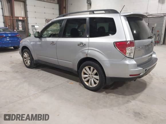 2012 Subaru Forester X Premium z VIN JF2SHADC9CH448112, wystawiony jako IAAI lot #43592598 z przebiegiem 105 556 mil mil oraz . Historia ofert i sprzedaży dostępna na DreamBid. Obrazek 3.