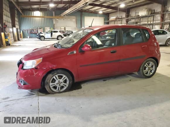 2011 Chevrolet Aveo 1LT with VIN KL1TD6DE1BB186883, listed as a Copart auction lot 52640915 with 113,032 mi miles and Salvage title. Bid and sale history available at DreamBid. Image 1.
