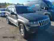 2003 Jeep Grand Cherokee Laredo z VIN 1J4GW48N03C521236, wystawiony jako IAAI lot #42122914 z przebiegiem 197 814 mil mil oraz . Historia ofert i sprzedaży dostępna na DreamBid. Obrazek 1.