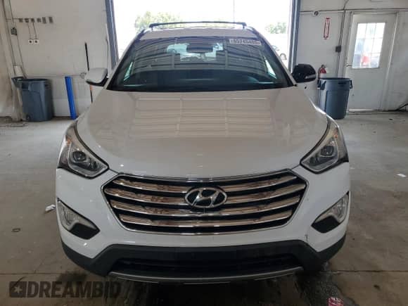 2014 Hyundai Santa Fe Limited z VIN KM8SNDHF0EU052475, wystawiony jako Copart lot #65745485 z przebiegiem 93 526 mil mil oraz Szkoda całkowita • Salvage title. Historia ofert i sprzedaży dostępna na DreamBid. Obrazek 5.