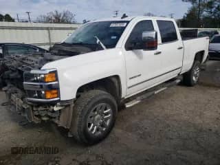 2018 Chevrolet Silverado 2500HD LTZ с VIN 1GC1KWEG2JF148205, выставлен на аукционе Copart как лот 87087534 с пробегом 111 406 миль миль и Списание • Salvage title. История ставок и продаж доступна на DreamBid. Изображение 1.
