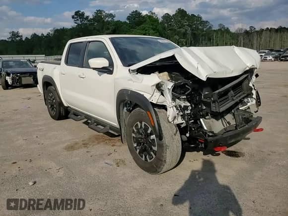 2023 Nissan Frontier Pro-X with VIN 1N6ED1EJ6PN661933, listed as a Copart auction lot 52496135 with 28,533 mi miles and Salvage title. Bid and sale history available at DreamBid. Image 10.