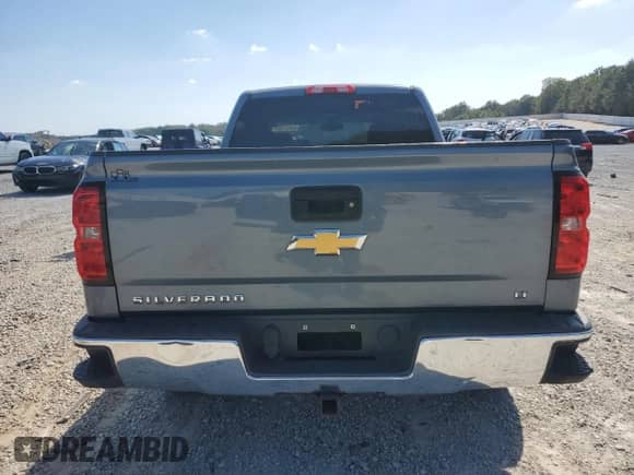 2016 Chevrolet Silverado 1500 LT with VIN 1GCRCREH7GZ219657, listed as a Copart auction lot 84907585 with 164,133 mi miles and Salvage title. Bid and sale history available at DreamBid. Image 6.