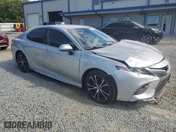 2020 Toyota Camry SE with VIN 4T1G11AK5LU873673, listed as a Copart auction lot 82445535 with 86,477 mi miles and Salvage title. Bid and sale history available at DreamBid. Image 4.