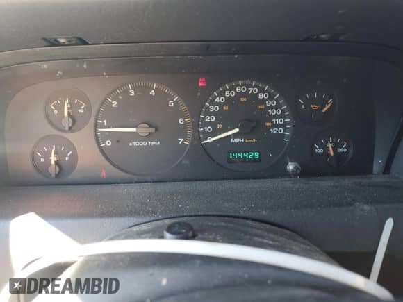 2002 Jeep Grand Cherokee Laredo with VIN 1J4GW48S42C251464, listed as a Copart auction lot 71964815 with 144,429 mi miles and Salvage title. Bid and sale history available at DreamBid. Image 9.