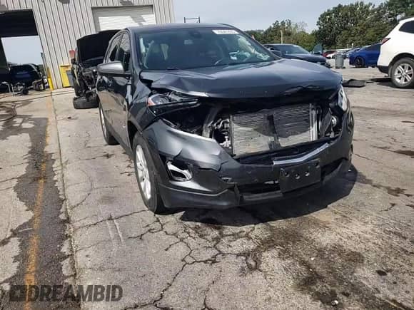 2020 Chevrolet Equinox LT с VIN 2GNAXKEV4L6276295, выставлен на аукционе Copart как лот 70541835 с пробегом 70 261 миль миль и Списание • Salvage title. История ставок и продаж доступна на DreamBid. Изображение 14.