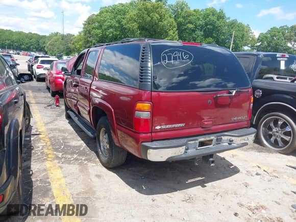 2003 Chevrolet Suburban LT z VIN 1GNEC16Z03J332440, wystawiony jako IAAI lot #42187347 z przebiegiem 176 717 mil mil oraz . Historia ofert i sprzedaży dostępna na DreamBid. Obrazek 3.