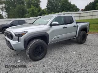 2024 Toyota Tacoma SR5 with VIN 3TYLB5JN8RT060119, listed as a Copart auction lot 83873505 with 25 mi miles and Salvage title. Bid and sale history available at DreamBid. Image 1.