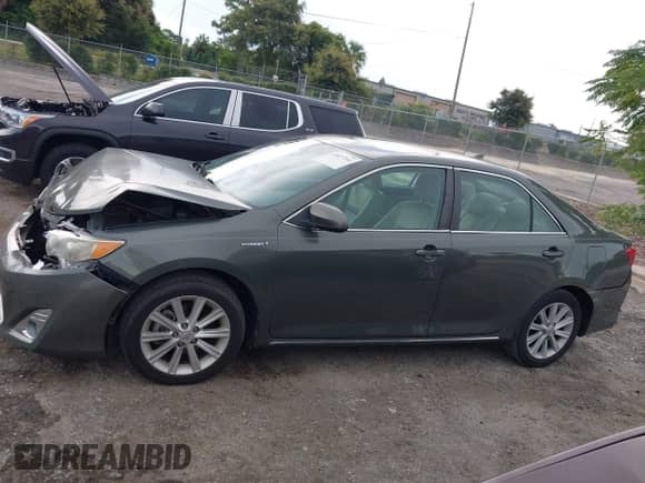 2013 Toyota Camry LE z VIN 4T1BD1FKXDU066965, wystawiony jako IAAI lot #43027264 z przebiegiem 98 455 mil mil oraz . Historia ofert i sprzedaży dostępna na DreamBid. Obrazek 14.