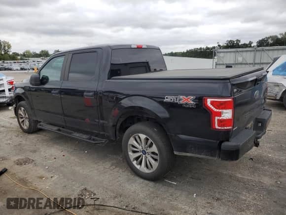 2018 Ford F-150 XL z VIN 1FTEW1EP3JFA32083, wystawiony jako Copart lot #71389215 z przebiegiem 168 093 mil mil oraz Szkoda całkowita • Salvage title. Historia ofert i sprzedaży dostępna na DreamBid. Obrazek 2.