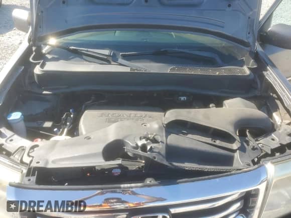 2014 Honda Pilot Touring with VIN 5FNYF3H93EB027479, listed as a Copart auction lot 71527965 with 195,840 mi miles and Salvage title. Bid and sale history available at DreamBid. Image 12.