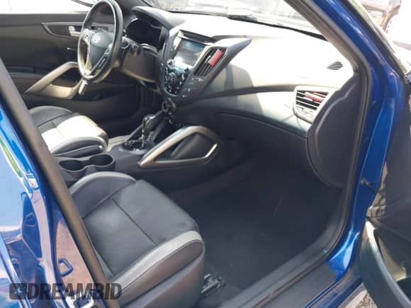 2016 Hyundai Veloster Turbo с VIN KMHTC6AE6GU261035, выставлен на аукционе IAAI как лот 42793352 с пробегом 49 706 миль миль и . История ставок и продаж доступна на DreamBid. Изображение 5.