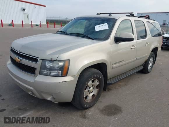 2007 Chevrolet Suburban LT z VIN 1GNFK16307J213375, wystawiony jako IAAI lot #43338812 z przebiegiem 220 975 mil mil oraz . Historia ofert i sprzedaży dostępna na DreamBid. Obrazek 2.