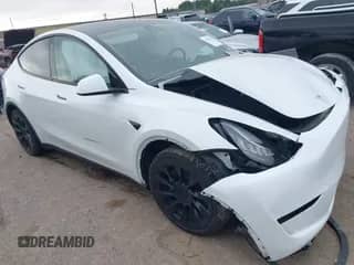2023 Tesla Model Y Long Range z VIN 7SAYGDEE4PA044024, wystawiony jako IAAI lot #43070806 z przebiegiem Nie podano mil oraz . Historia ofert i sprzedaży dostępna na DreamBid. Obrazek 1.